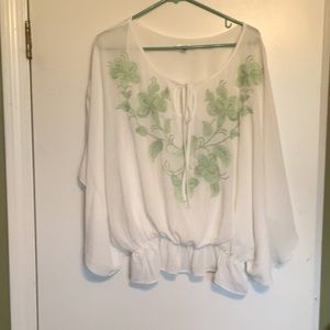 Bell sleeve tie waist blouse with design.